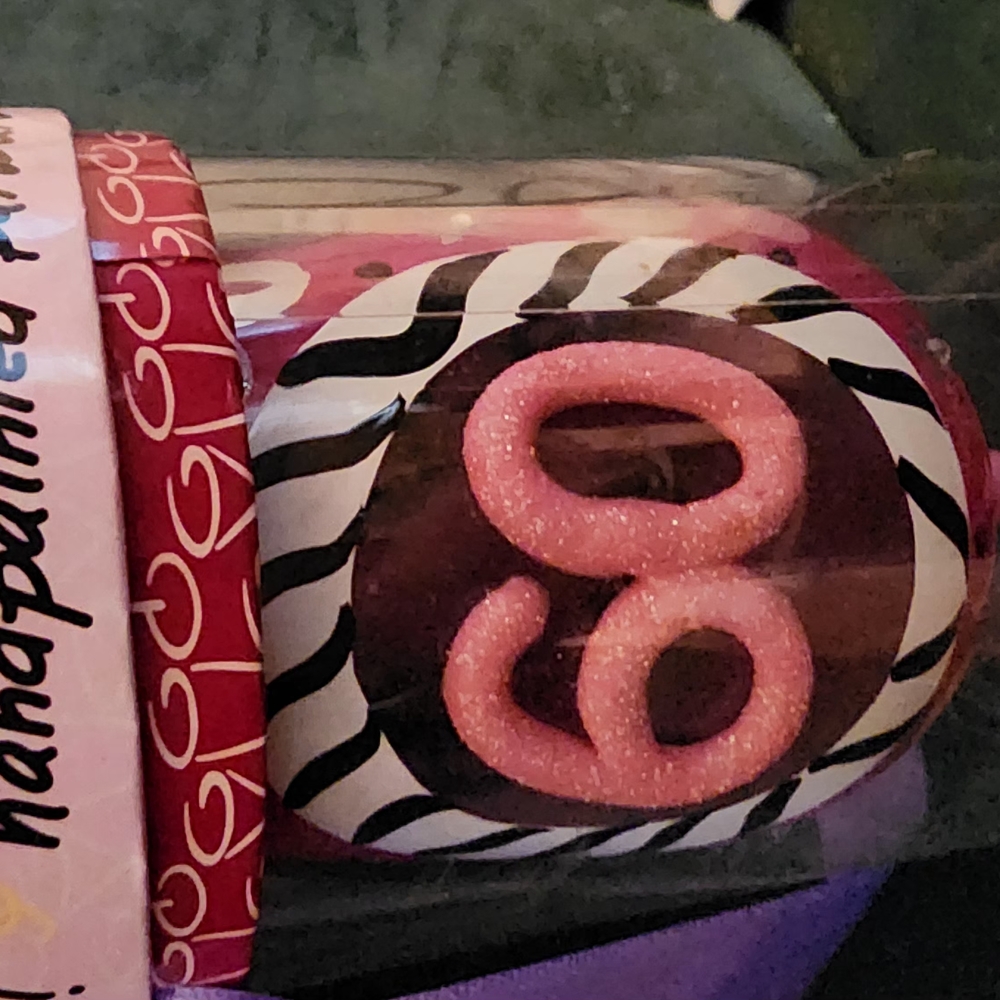 Pink and Black Hand-Painted Ornament